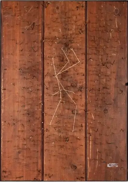 Three wood panels with holes connected by string to form a constellation.