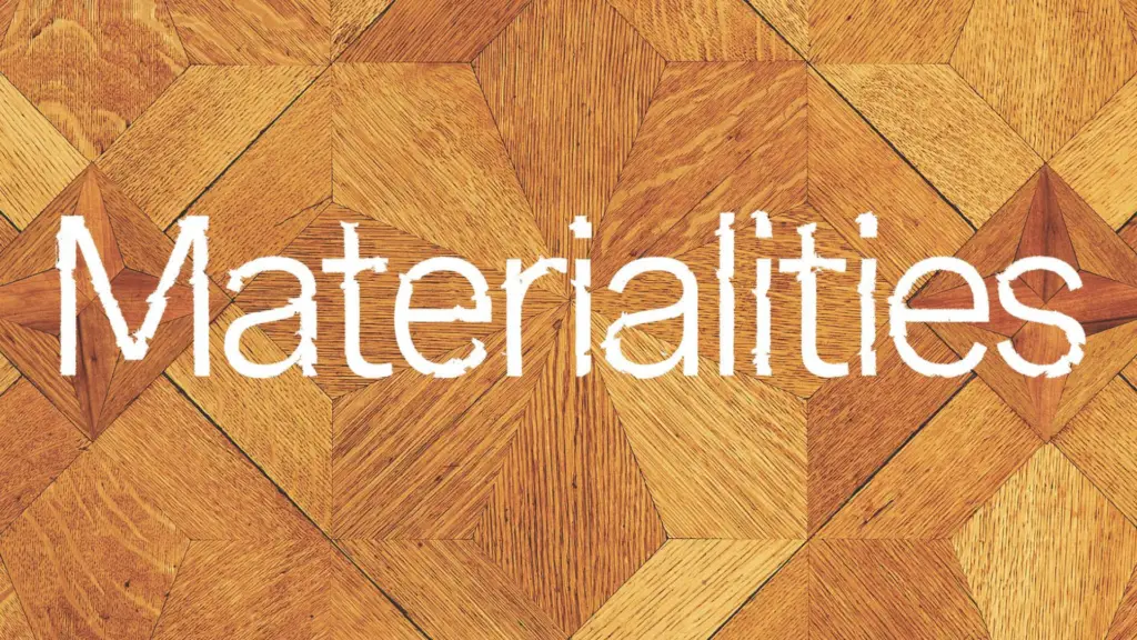 Photo of a wood floor set in a diamond patter with text on top that says "Materialities."